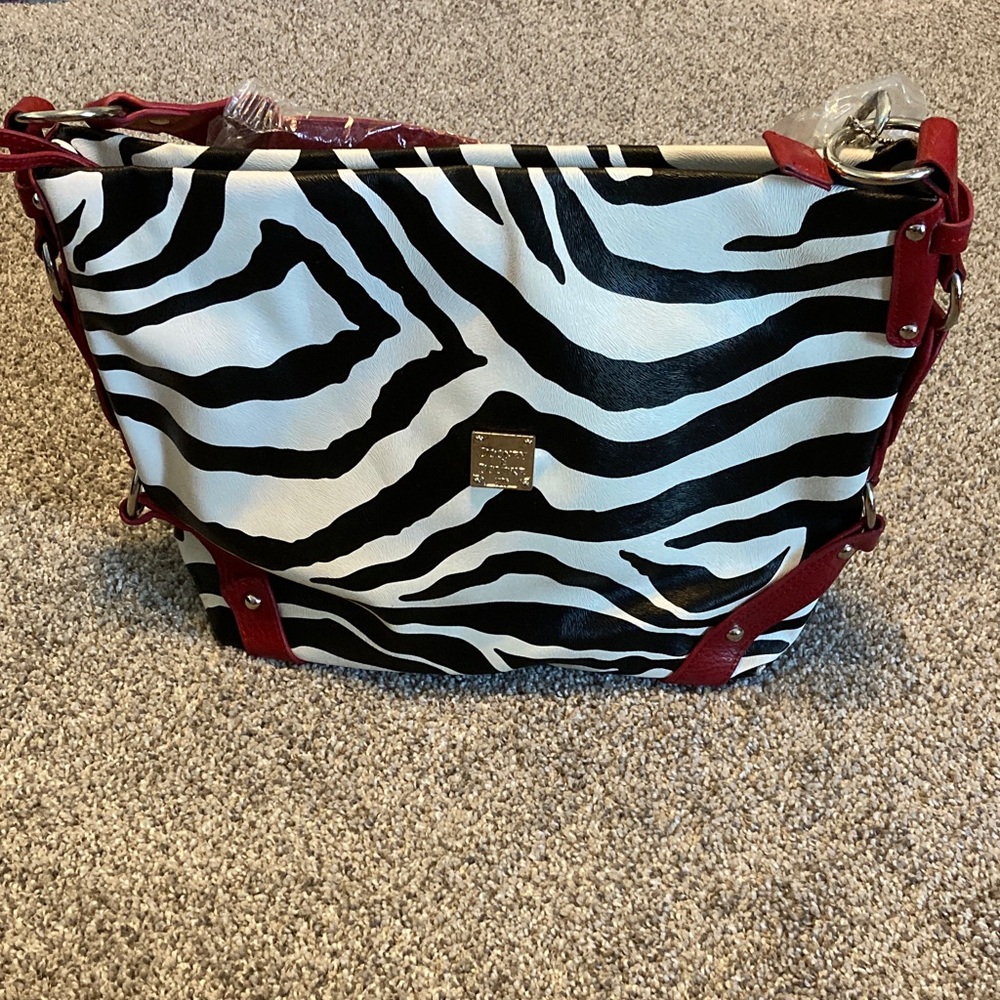 New Dooney and Bourke Zebra Print Women's Bag with Red Accents